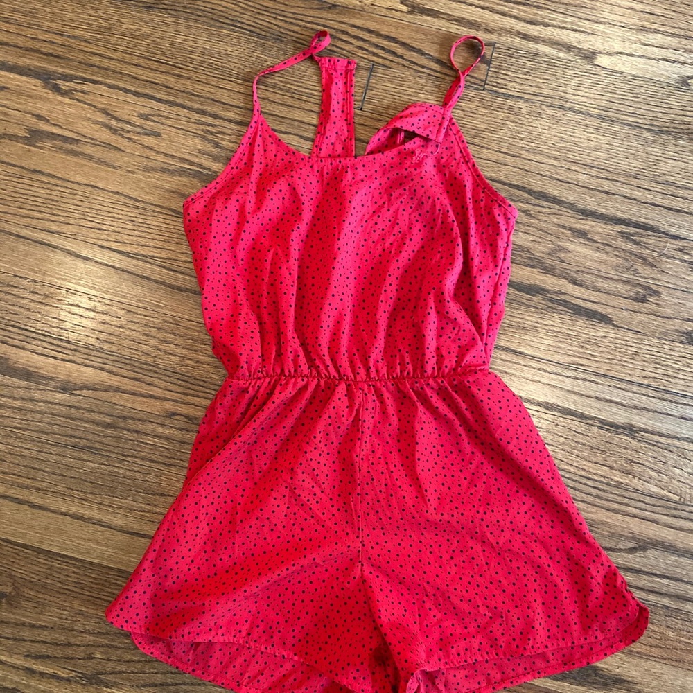 Red romper with black polkadots